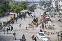 ছবিতে দেখুন: জমায়েত উঠতেই ক্রেন দিয়ে রাস্তা পরিষ্কার শাহিনবাগের, এলাকায় মাস্ক মুখে টহল নিরাপত্তারক্ষীদের