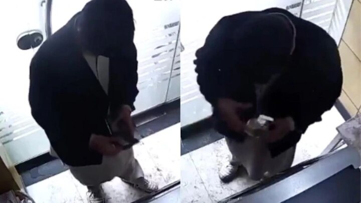 Coronavirus- Video of man stealing sanitiser from ATM goes viral করোনার ভয়ে এটিএম থেকে চুরি হচ্ছে স্যানিটাইজার, ভিডিও ভাইরাল