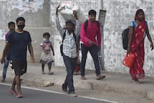 পায়ে দগদগে ফোস্কা, হাজার মাইল হেঁটে বাড়ি ফিরছেন পরিযায়ী শ্রমিকরা