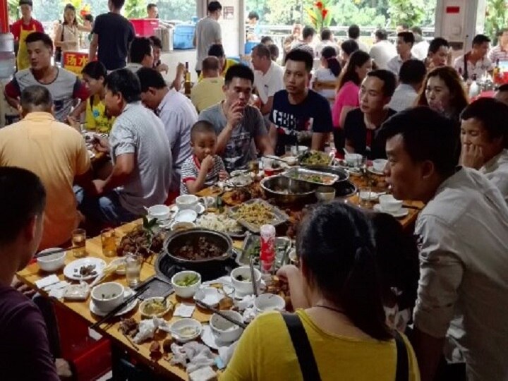 Chinas annual dog-meat fair opens, activists hope for last time করোনা চলছে পুরোদমে, তারই মধ্যে চালু হল চিনের বার্ষিক কুকুর মাংসের মেলা