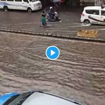 প্রবল বৃষ্টিতে নগরবাসীকে রক্ষা করতে ঠায় পাঁচ ঘণ্টা খোলা ম্যানহোল পাহারা দিলেন মুম্বইয়ের মহিলা!