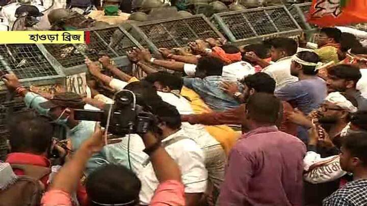 হাওড়া ব্রিজে দফায় দফায় পুলিশের ব্যারিকেড ভাঙার চেষ্টা বিজেপির। জলকামান দিয়ে ছত্রভঙ্গ করে পুলিশ। হাওড়া ব্রিজের মুখেই বিজেপি কর্মীদের আটকে দেয় পুলিশ। 