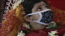 মুখে মাস্ক, করোনা আবহে কুমারী পুজোর অন্য ছবি বাগবাজার, বেলুড়মঠে