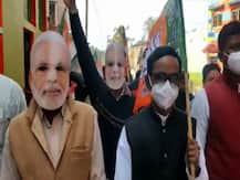 ছবিতে দেখুন-মোদি মুখোশ পরে ‘আর নয় অন্যায়’ কর্মসূচি বাঁকুড়ার বিজেপি কর্মীদের