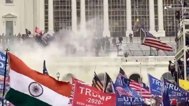 Indian tricolour spotted among American flags during US Capitol Hill attack ক্যাপিটল হিল বিক্ষোভে ভারতের তেরঙা! হতবাক টুইটার
