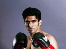 विजेंदरचा विजयी पंच, चीनच्या मायमायतियालीवर शानदार विजय