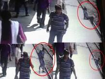 VIDEO : धावत्या ट्रेनखाली उडी मारुन महिलेचा आत्महत्येचा प्रयत्न