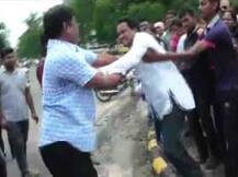 राणेंच्या पुतळ्याच्या दहनावेळी भाजप कार्यकर्ते आपापसातच भिडले