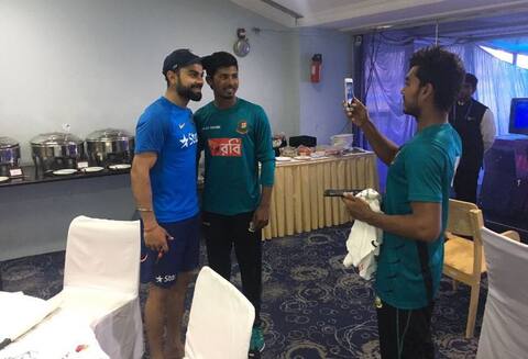 बांगलादेशच्या खेळाडूंचं विराट कोहलीसोबत फोटो सेशन बांगलादेशच्या खेळाडूंचं विराट कोहलीसोबत फोटो सेशन