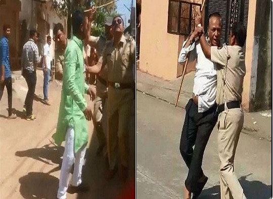 Solapur Bjp Candidate Beaten Up By Police For Creating Ruckus सोलापुरात गोंधळी भाजप उमेदवाराला पोलिसांची मारहाण