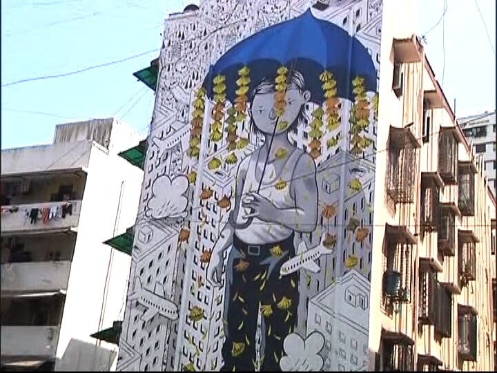 मुंबईच्या धारावीतील काही इमारती आकर्षक चित्रांनी रंगल्या आहेत. 