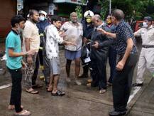 PHOTO | मुंबईमध्ये मुसळधार पावसात दोन ठिकाणी इमारती कोसळल्याची दुर्घटना; 8 जणांचा मृत्यू