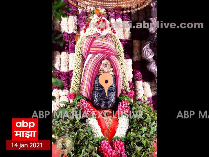 मकर संक्रांतीच्या औचित्यावर विठुरायाच्या मंदिराला पुण्यातील भक्ताने आकर्षक फुलांची सजावट केली आहे. 