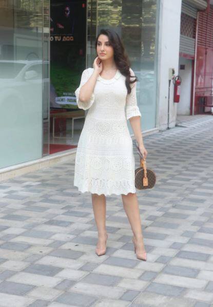 या फोटोंमध्ये नोराचा क्लासी लूक तुम्ही पाहू शकता. 