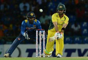 Australia's Glenn Maxwell (R) is watched by Sri Lanka's wicketkeeper Kusal Perera as he hits a shot during the first T20 international cricket match between Sri Lanka and Australia at the Pallekele International Cricket Stadium in Pallekele on September 6, 2016. / AFP / LAKRUWAN WANNIARACHCHI        (Photo credit should read LAKRUWAN WANNIARACHCHI/AFP/Getty Images)