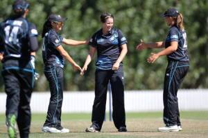 CHRISTCHURCH, NEW ZEALAND - FEBRUARY 24: Holly Huddleston (2nd R) of New Zealand is congratulated by Suzie Bates (R) after a wicket during game two of the One Day International series between New Zealand and the West Indies at Bert Sutcliffe Oval, Lincoln University on February 24, 2014 in Christchurch, New Zealand. (Photo by Martin Hunter/Getty Images)