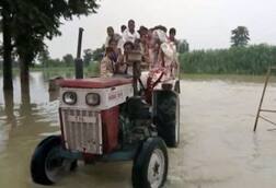 ਹੜ੍ਹ ਨੇ ਰੋਕੀ ਬਾਰਾਤ, ਟਰੈਕਟਰ 'ਤੇ ਚੜ੍ਹ ਪਹੁੰਚਿਆ ਲਾੜਾ