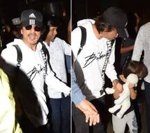 ਏਅਰਪੋਰਟ \'ਤੇ ਕੁਝ ਇਸ ਅੰਦਾਜ਼ \'ਚ ਨਜ਼ਰ ਆਏ ਸ਼ਾਹਰੁਖ-ਅਬਰਾਮ