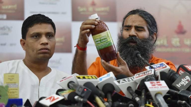 usfda found different dietary medicinal claims on patanjali sharbat bottles ਰਾਮਦੇਵ ਦੇ ਸ਼ਰਬਤ ਦੀ ਖੁੱਲ੍ਹੀ ਪੋਲ, ਹੁਣ ਮੁਕੱਦਮੇ ਦੀ ਤਲਵਾਰ