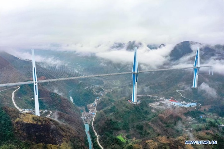 Now China has made the world's highest bridge, trains and vehicles can run together ਚੀਨ ਨੇ ਬਣਾਇਆ ਦੁਨੀਆ ਦਾ ਸਭ ਤੋਂ ਉੱਚਾ ਬ੍ਰਿਜ ਟਾਵਰ, ਇਕੱਠੇ ਚੱਲ ਸਕਦੀ ਕਾਰ ਤੇ ਰੇਲ