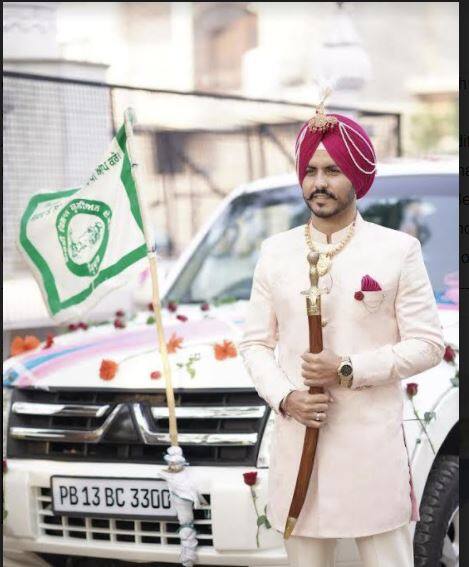 Farmer's flag on Jass Bajwa's procession car, pictures surfaced ਜੱਸ ਬਾਜਵਾ ਦੀ ਬਾਰਾਤ ਵਾਲੀ ਕਾਰ 'ਤੇ ਕਿਸਾਨੀ ਝੰਡਾ, ਤਸਵੀਰਾਂ ਆਈਆਂ ਸਾਹਮਣੇ