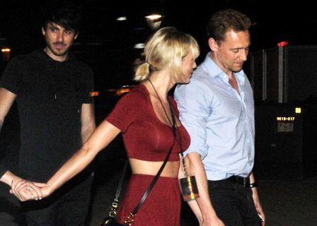 See PICS: Taylor Swift gets COSY with Tom Hiddleston at Gomez’s concert