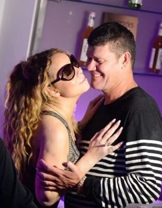 SEE PICS: Mariah Carey and fiancé James Packer HOT romance at a party!