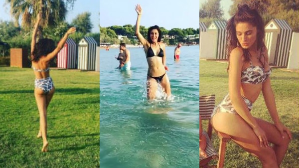 IN PICS: Nargis Fakhri FLAUNTS her HOT BODY in a PINK Victoria Secret BIKINI!