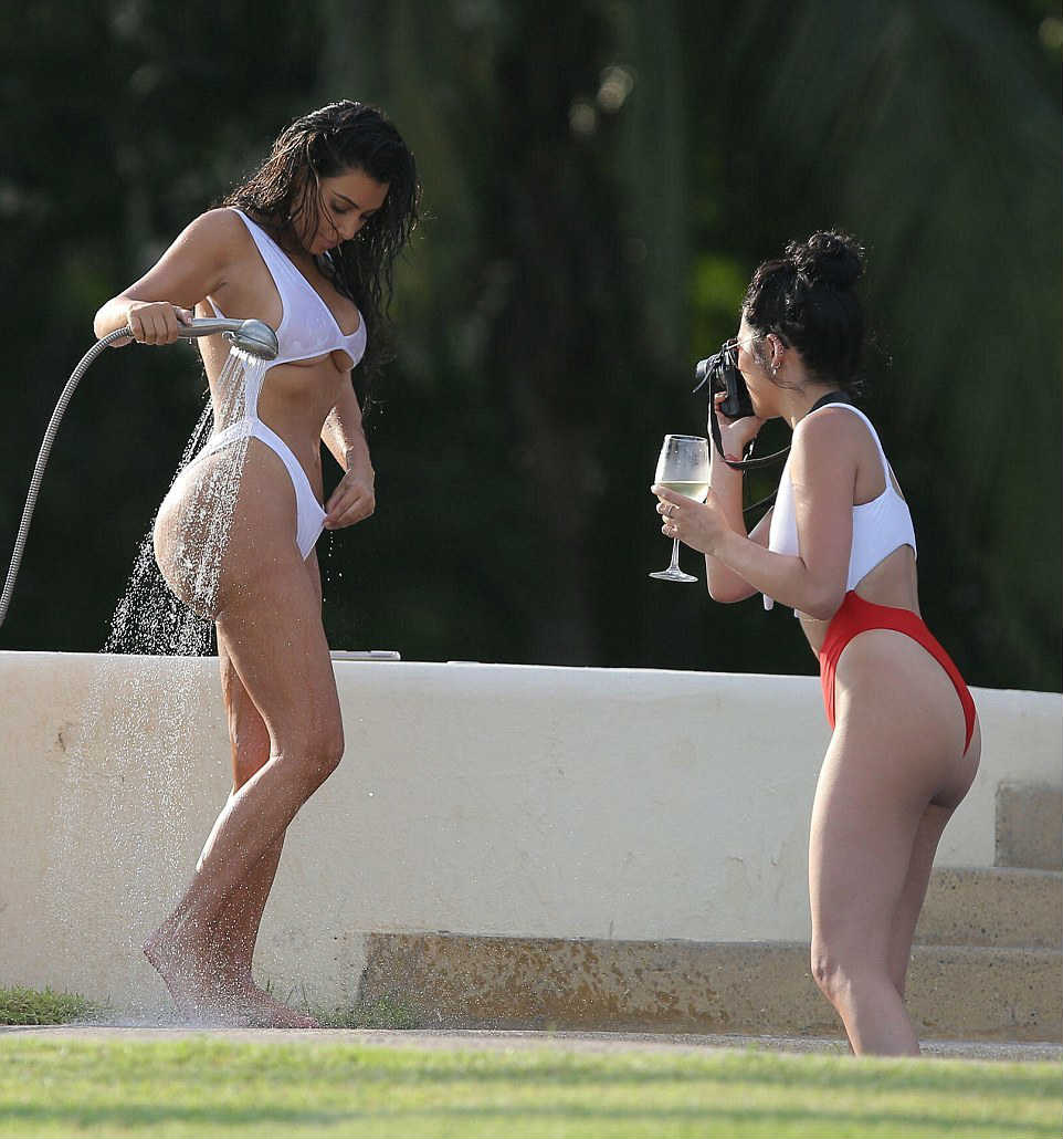 SEE PICS Kim Kardashian Flashes Underb B Her Famous BUTT In A WHITE