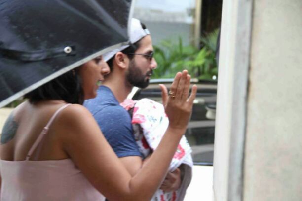 First PICS & VIDEO of Shahid Kapoor, Mira Rajput with baby girl; Daddy protects daughter from rain!