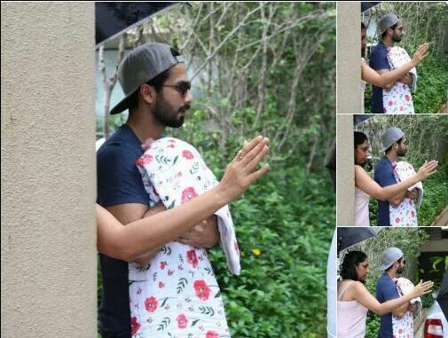 First PICS & VIDEO of Shahid Kapoor, Mira Rajput with baby girl; Daddy protects daughter from rain!