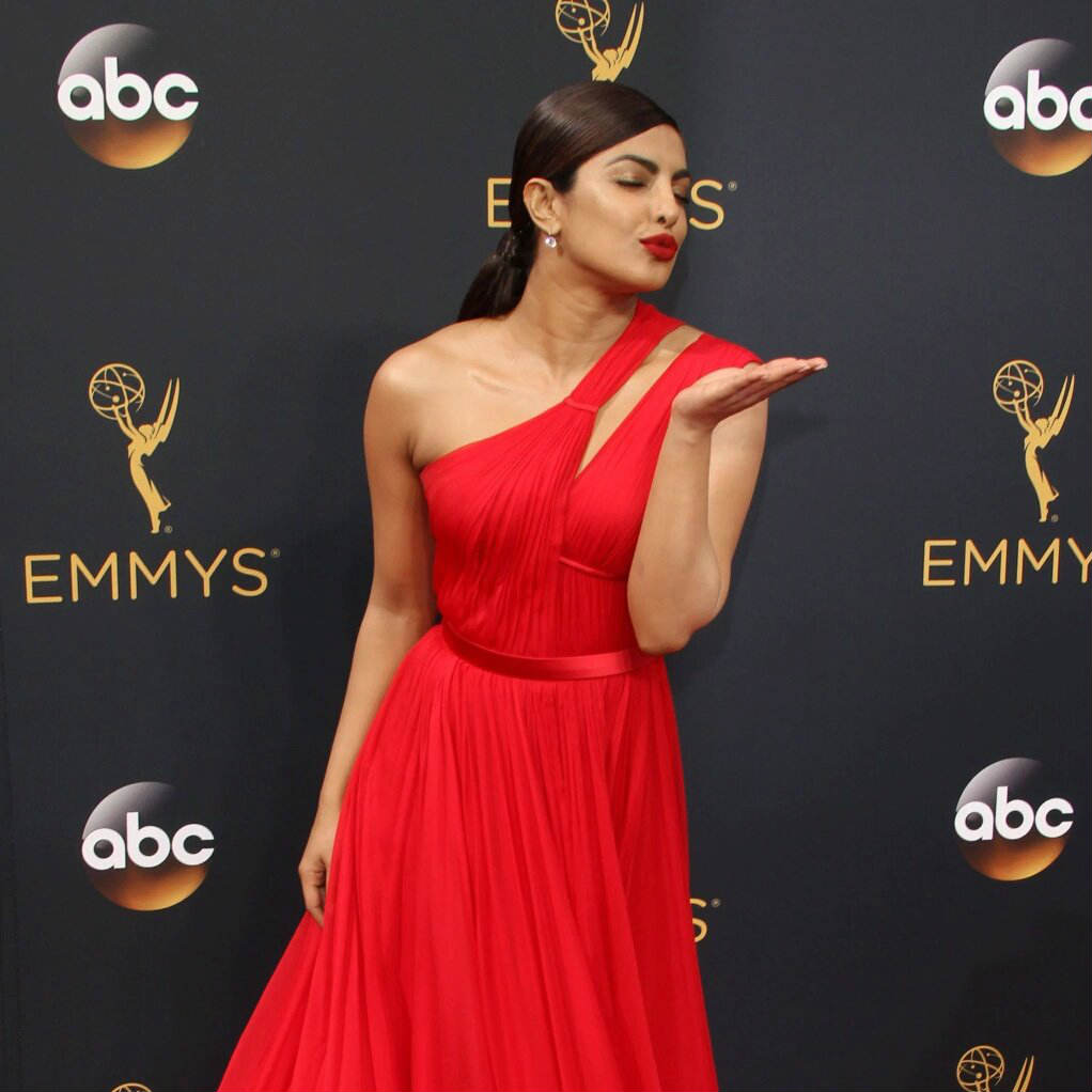 SEE PICS: Priyanka Chopra turns every head on the RED CARPET in a STUNNING crimson gown at Emmy Awards 2016!