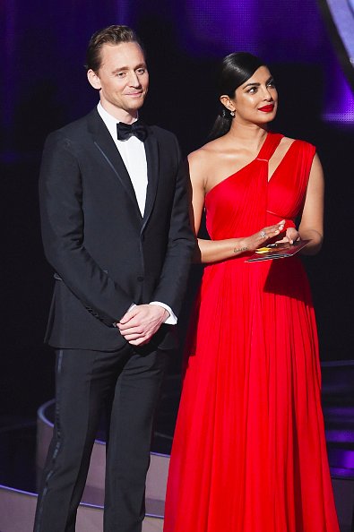 SEE PICS: Priyanka Chopra turns every head on the RED CARPET in a STUNNING crimson gown at Emmy Awards 2016!