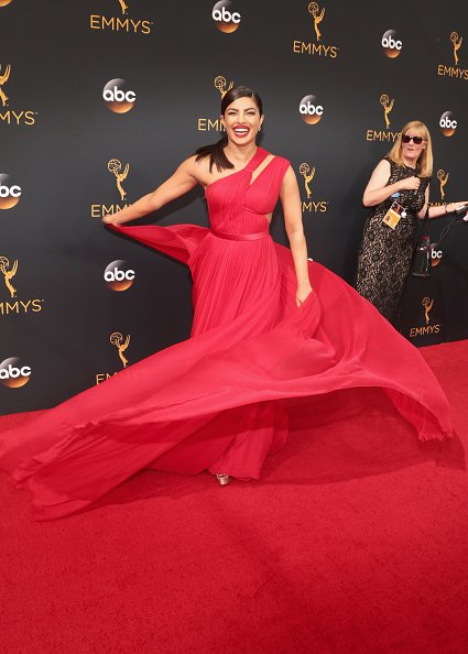 SEE PICS: Priyanka Chopra turns every head on the RED CARPET in a STUNNING crimson gown at Emmy Awards 2016!