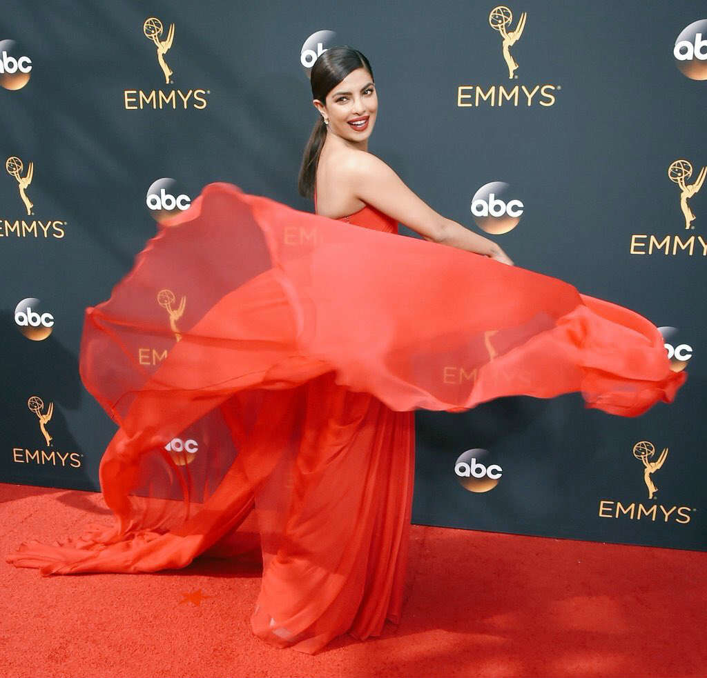 SEE PICS: Priyanka Chopra turns every head on the RED CARPET in a STUNNING crimson gown at Emmy Awards 2016!