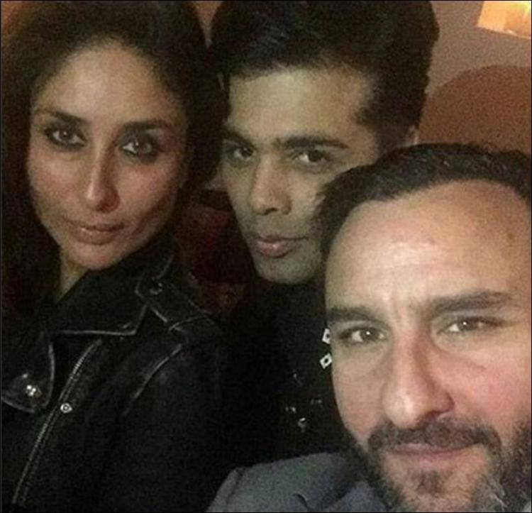 Karan with friend star couple Kareena and Saif at a get-together