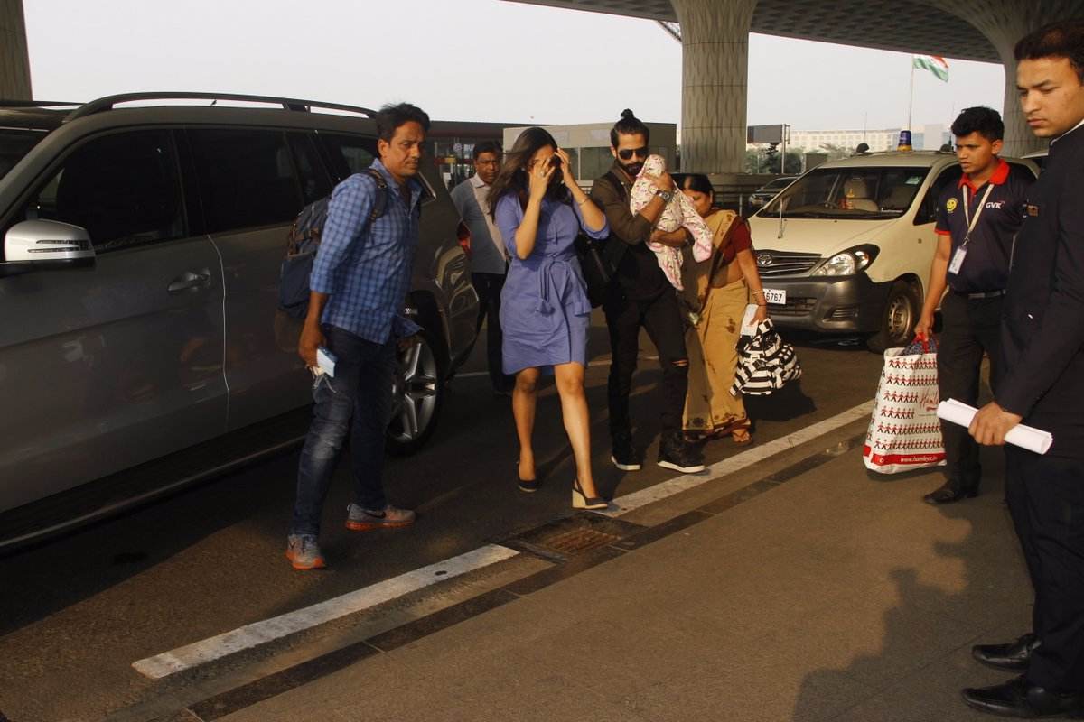 IN PICS: Shahid Kapoor & wife Mira look SUPER STYLISH as they travel with BABY Misha!