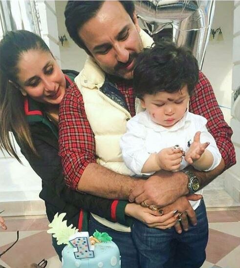 PIC ALERT! Kareena's son Taimur staring at daddy Saif's photo is the cutest thing you will see on internet today!