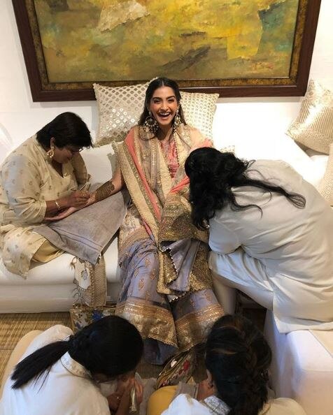 WATCH: Bride-to-be Sonam Kapoor dances her heart out with husband-to-be Anand Ahuja at their Mehendi ceremony!