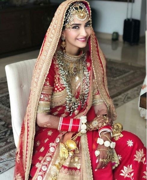 INSIDE VIDEO: Sonam Kapoor's BRIDAL ENTRY with her brothers Arjun & Harshwardhan will make you go AWWW!