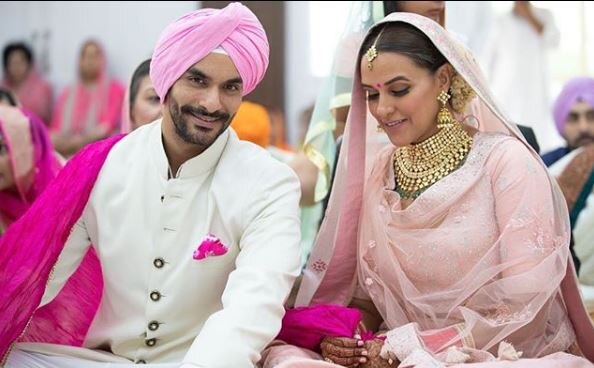 Newly-married Neha Dhupia gets emtional as she HUGS her father during BIDAAI ceremony!
