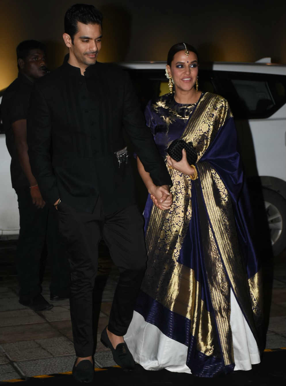 PICS: Newlywed actress Neha Dhupia, husband Angad Bedi dazzle at Poorna Patel's star-studded wedding reception