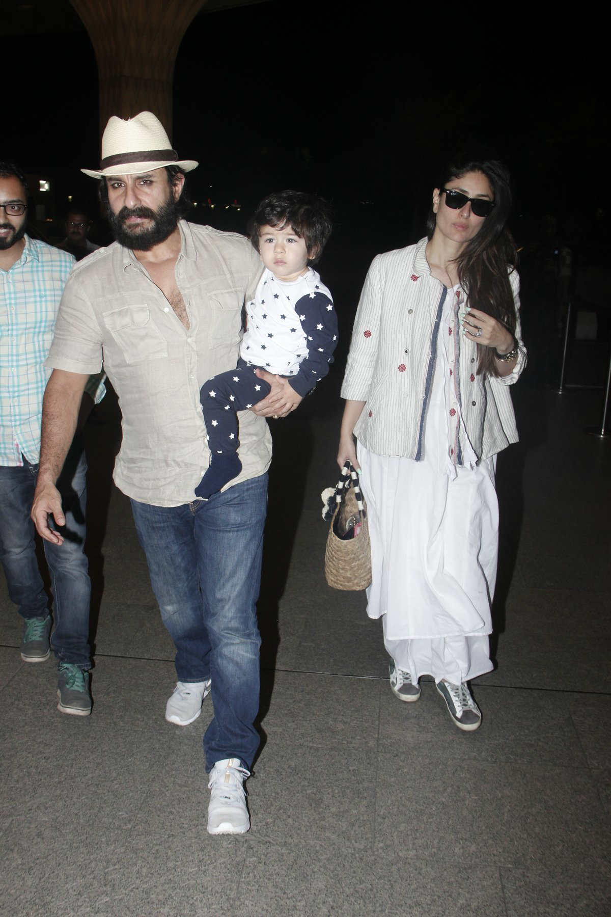 IN PICS: Saif Ali Khan gets goofy as he lands in Maldives with his sleepy BABY Taimur & wife Kareena Kapoor Khan!