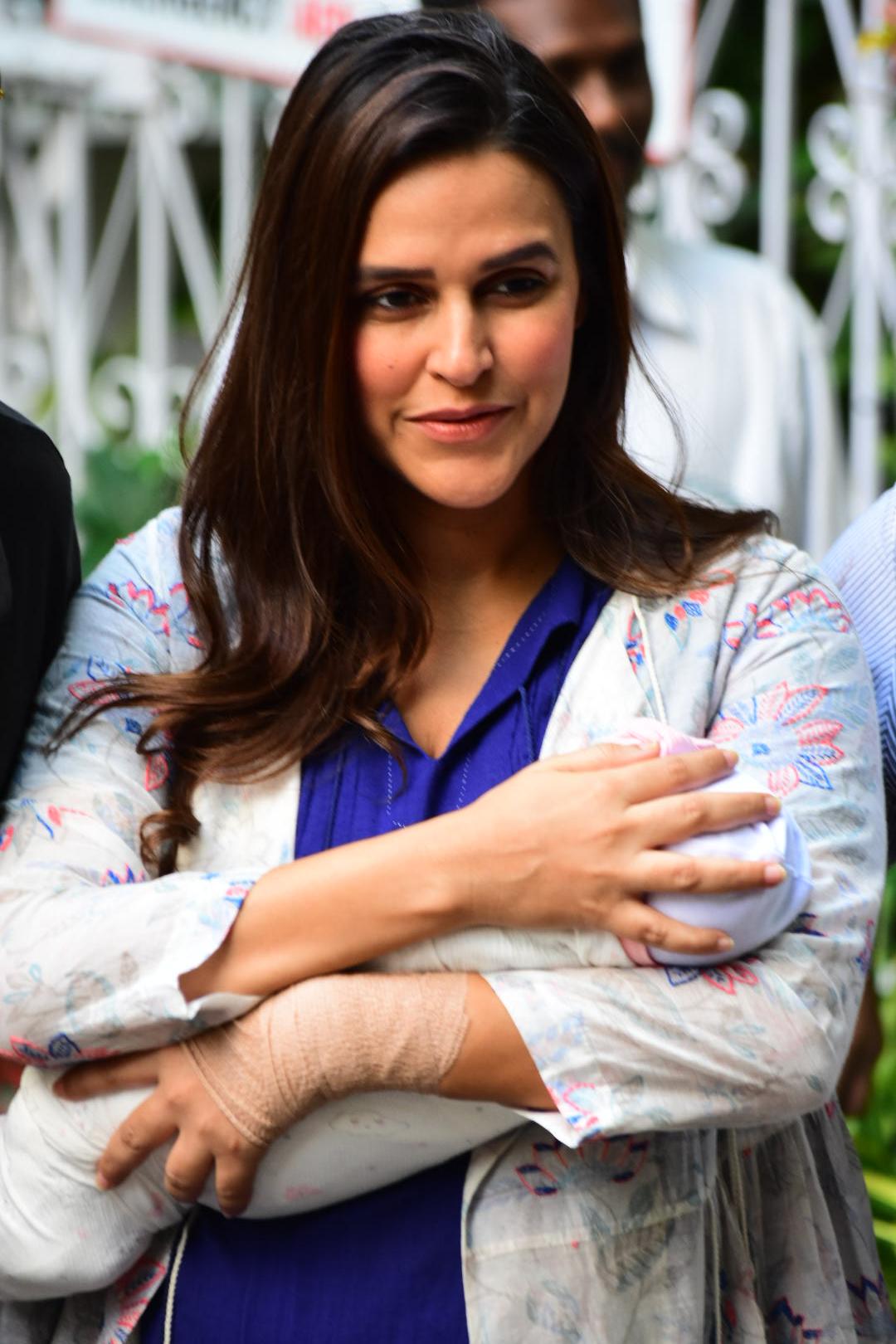 New mommy Neha Dhupia back to work, just 10 days after giving birth to her baby girl Mehr; SEE PICS