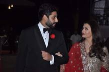 PICS: પતિ સાથે આ અવતારમાં જોવા મળી એશ, રેડ ડ્રેસમાં લાગી Gorgeous! 