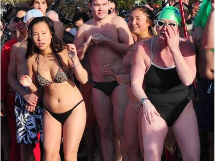 VANCOUVER, BC., January 1, 2018 -- Participants in the 57th annual Polar Bear Swim in action at English Bay in Vancouver, BC., January 1, 2018. (NICK PROCAYLO/PostMedia) 00051866A