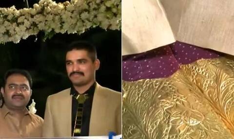 Lavish Wedding: પાકિસ્તાનમાં દુલ્હાએ પહેર્યા સોનાના શૂઝ અને ટાઈ, કિંમત જાણીને તમે ચોંકી જશો Lavish Wedding: પાકિસ્તાનમાં દુલ્હાએ પહેર્યા સોનાના શૂઝ અને ટાઈ, કિંમત જાણીને તમે ચોંકી જશો