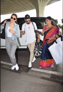 પતિ વિરાટ કોહલી સાથે મુંબઈ એરપોર્ટ પર નજરે પડી અનુષ્કા શર્મા, જુઓ તસવીરો