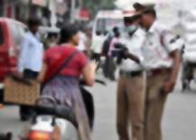 અમદાવાદમાં ટોઈંગ કરીને એક્ટિવા લઈ જતાં મહિલાએ ટ્રાફિક પોલીસને લાફો મારી દીધો પછી શું થયું? જાણો વિગત