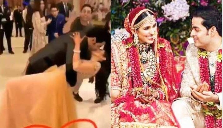 Akash Ambani kisses her wife Shloka Mehta in wedding Reception Party   લગ્ન બાદ આકાશ અંબાણીએ પત્ની શ્લોકાને જાહેરમાં કરી કિસ, જુઓ વીડિયો